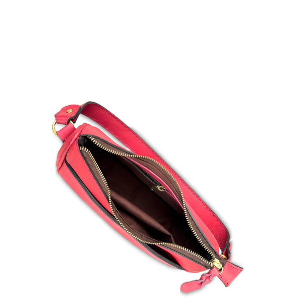 Red handbag with gold zipper on a white background