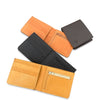 Four leather wallets in different colors on a white background