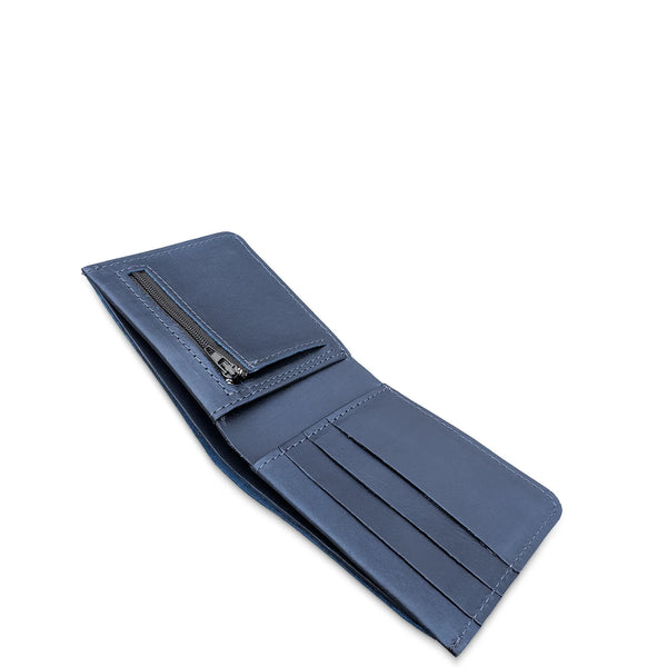 Blue leather wallet with a zipper on a white background