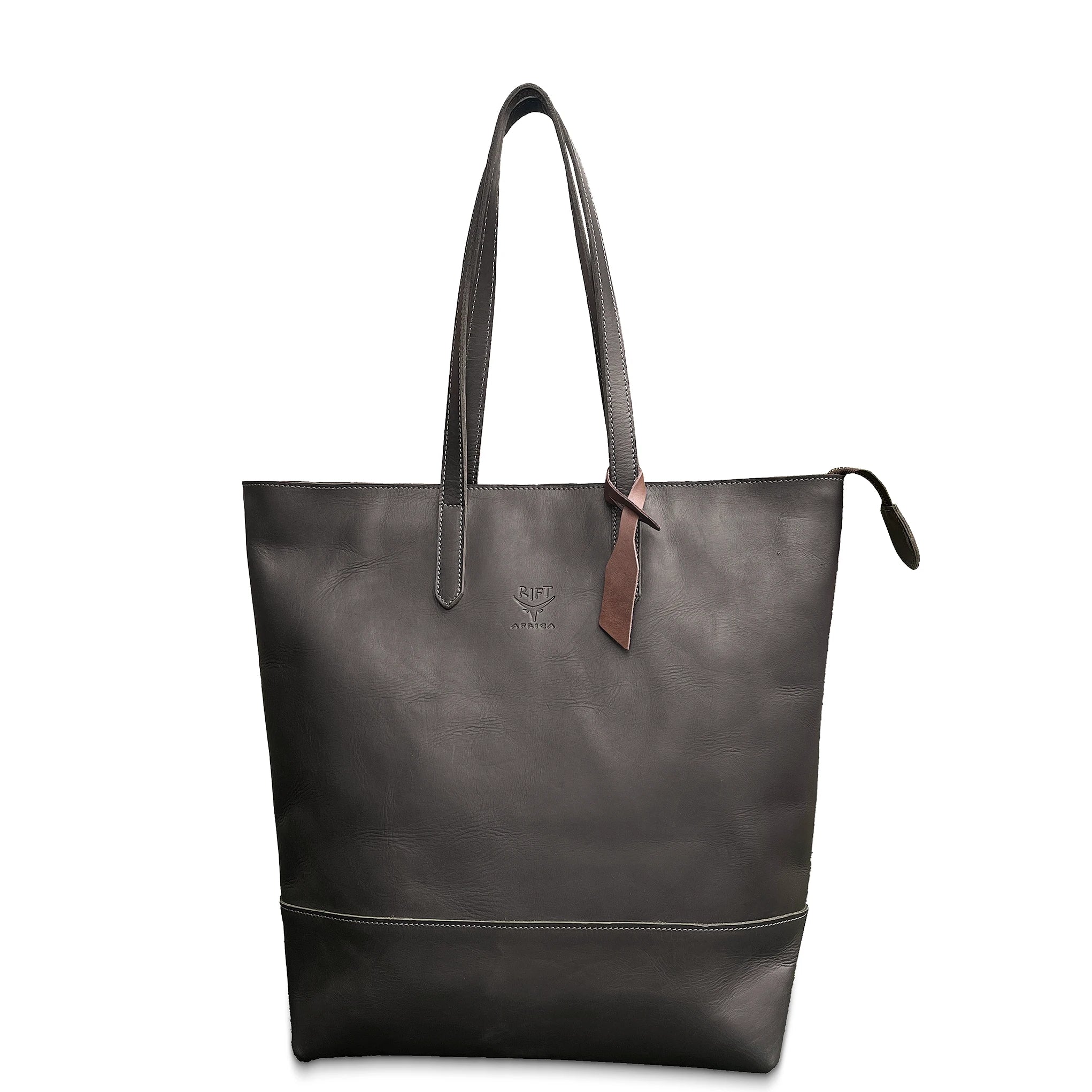 Brown tote bag with a strap on a white background