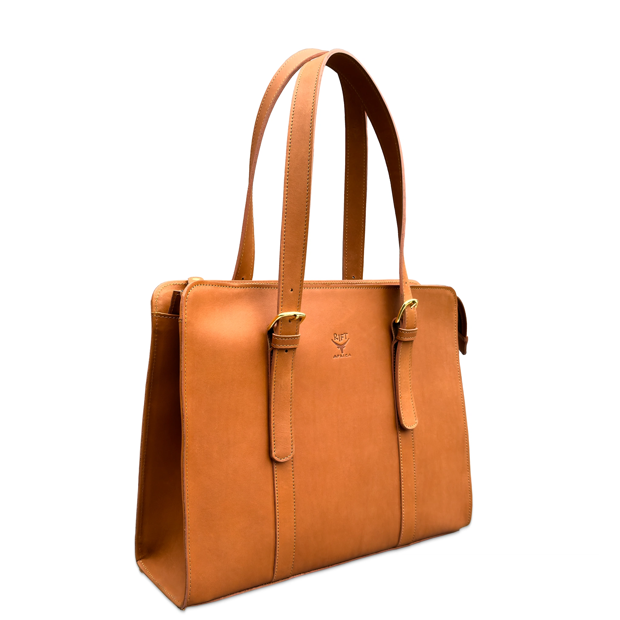 A tan leather tote bag with double shoulder straps, gold-tone buckle details, and a small embossed logo on the front, shown against a plain white background.