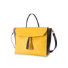 Yellow handbag with black accents and tassels on a white background