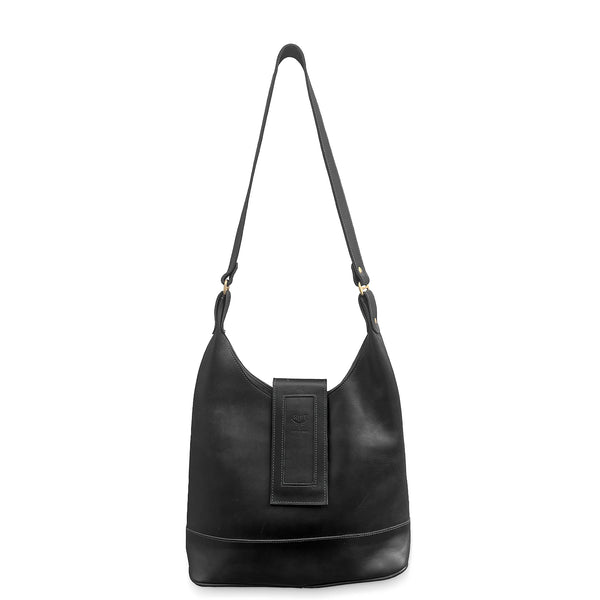 Black leather handbag with a strap on a white background