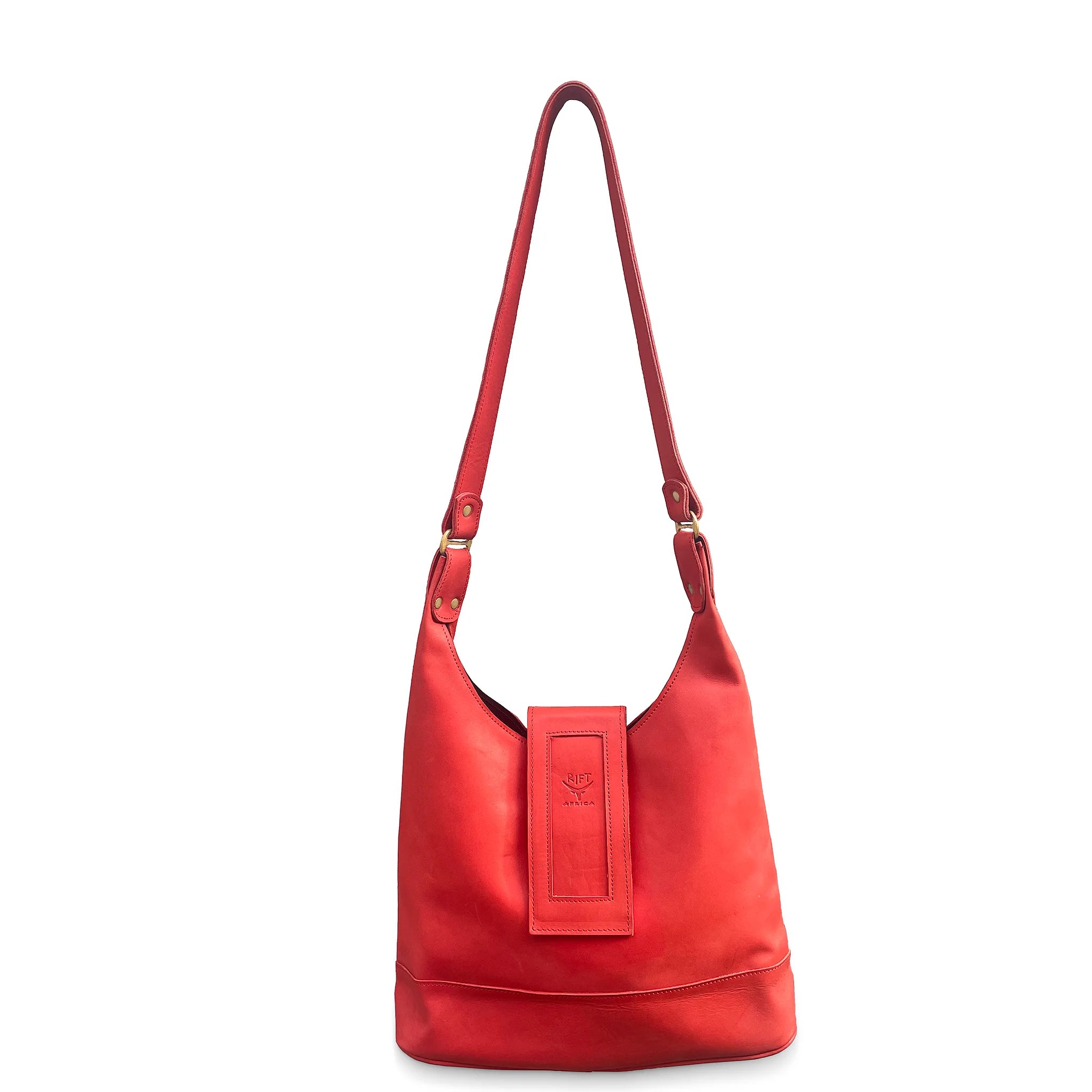 Red handbag with a strap on a white background
