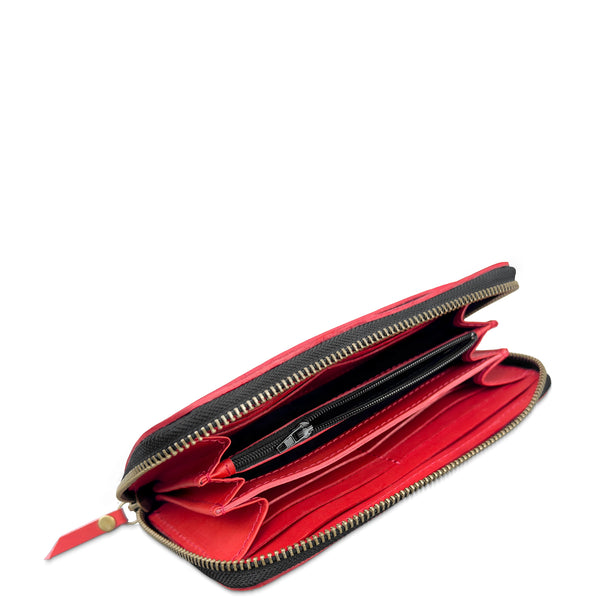 An open red leather zip-around wallet with black trim and gold-tone zippers, showing multiple interior card slots and compartments on a white background.