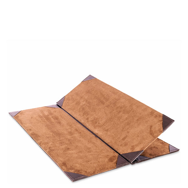 Brown leather menu cover with metal corners on a white background
