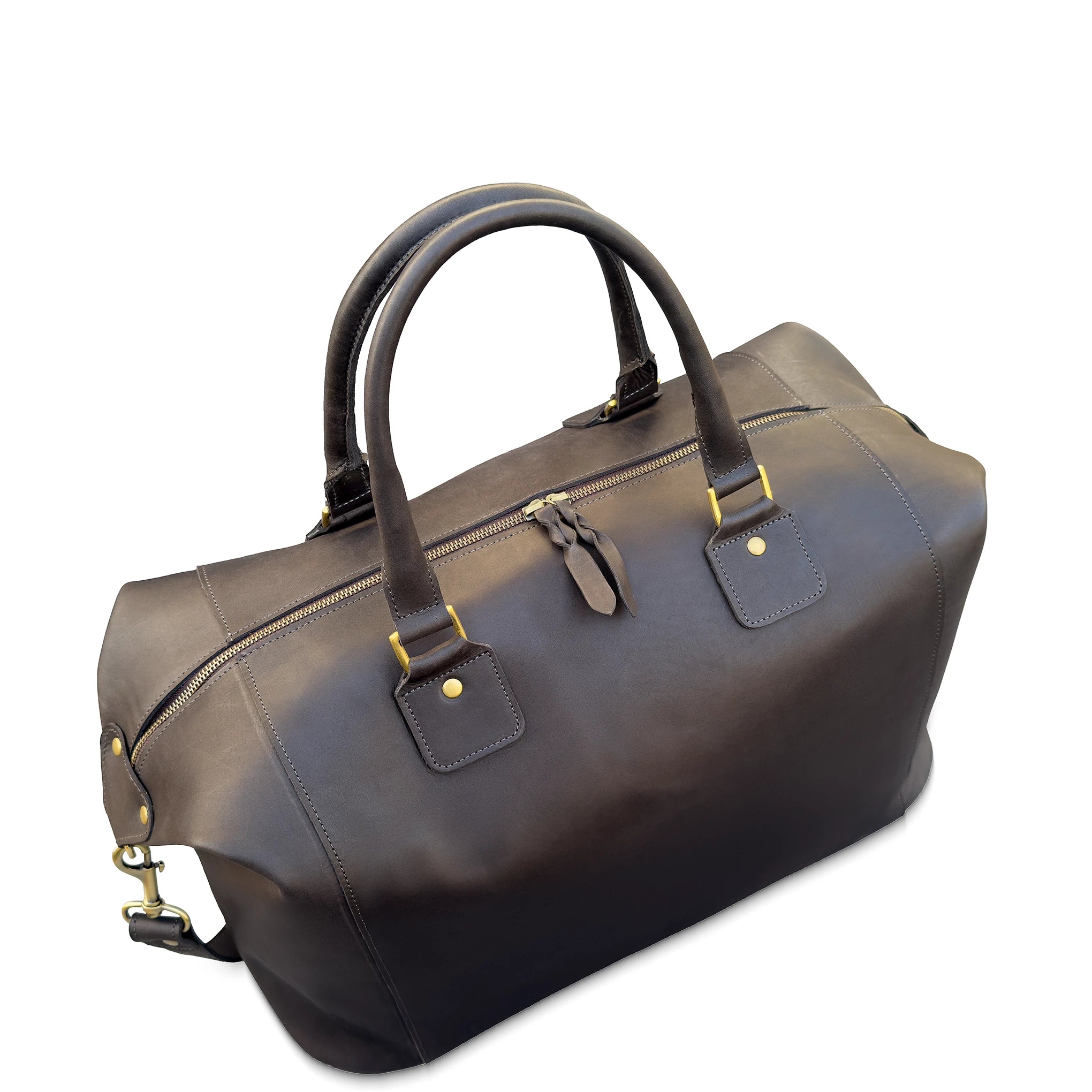 Brown leather duffel bag with gold hardware on a white background