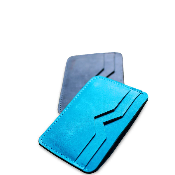 Blue and gray leather cardholder on a white background