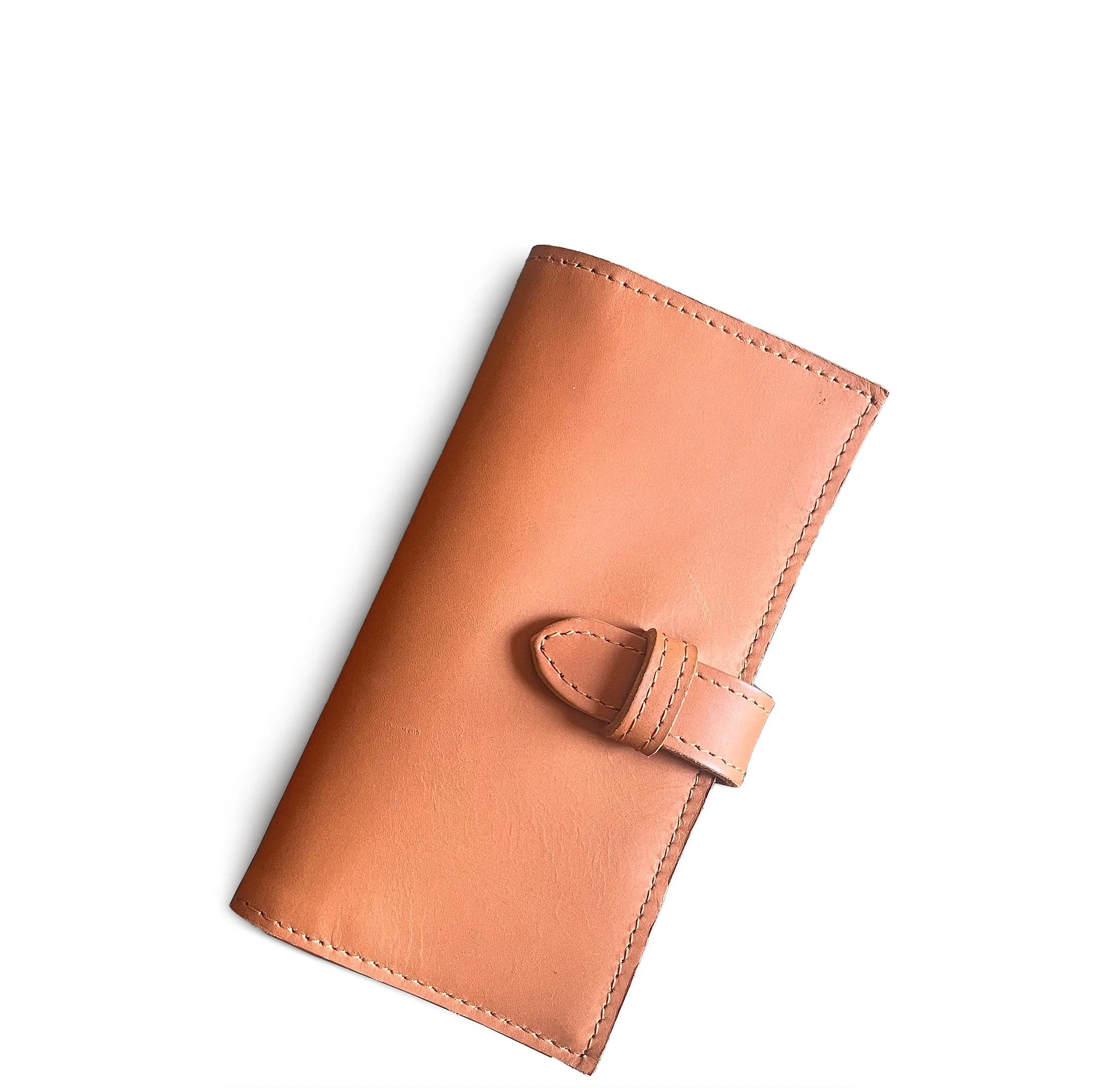 Tan leather wallet on a white background