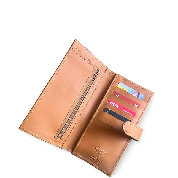 Open tan leather wallet with cards on a white background