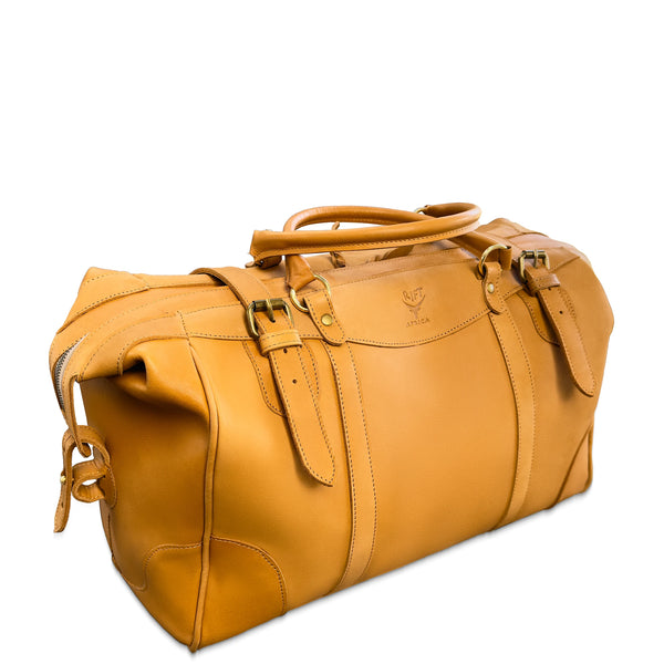 Brown leather duffel bag on a white background