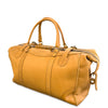 Tan leather duffel bag on a white background