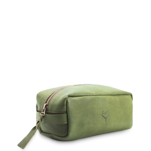 Green toiletry bag with a visible brand logo on a white background