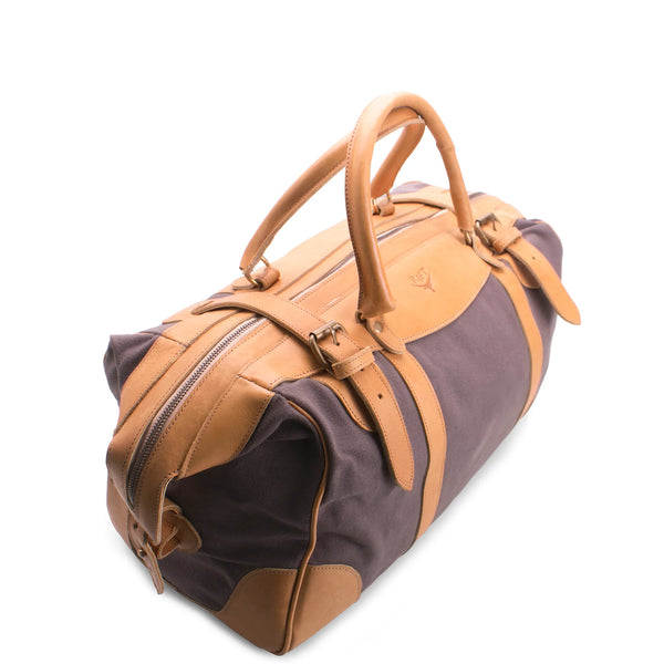 Brown and beige duffel bag on a white background