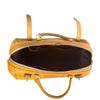 A tan leather duffel bag shown open, displaying its dark brown interior lining, top handles, and zipper closure against a plain white background.