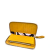 A tan leather zip-around wallet shown open, displaying its interior card slots, patterned lining, and matching leather zipper pull on a white background.