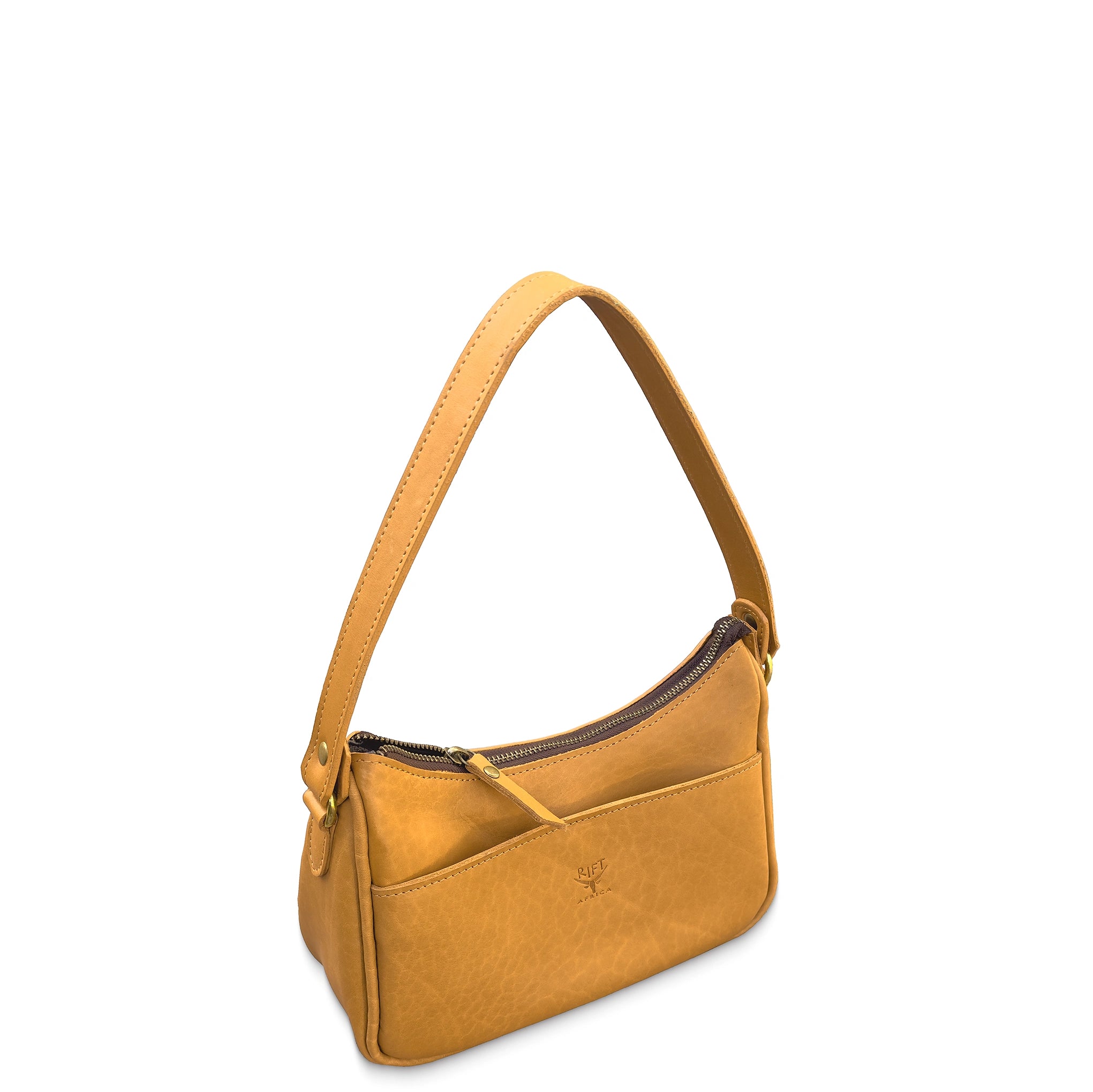 Tan leather handbag with a strap on a white background
