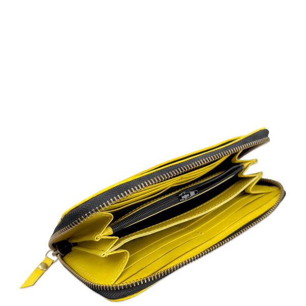 A bright yellow leather zip-around wallet shown open, displaying its interior card slots, gold-tone zippers, and a matching yellow pull tab on a plain white background.