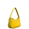 Yellow leather handbag on a white background