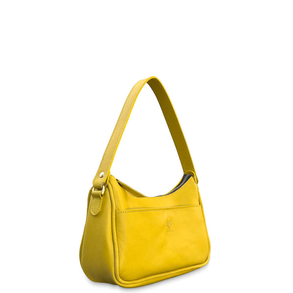 Yellow leather handbag on a white background