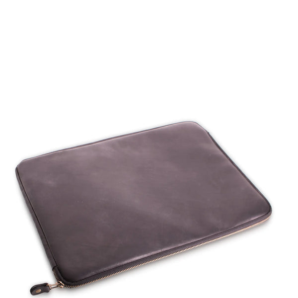 brown leather laptop case with a zipper on a white background