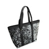 Black and white patterned tote bag with black handles on a white background